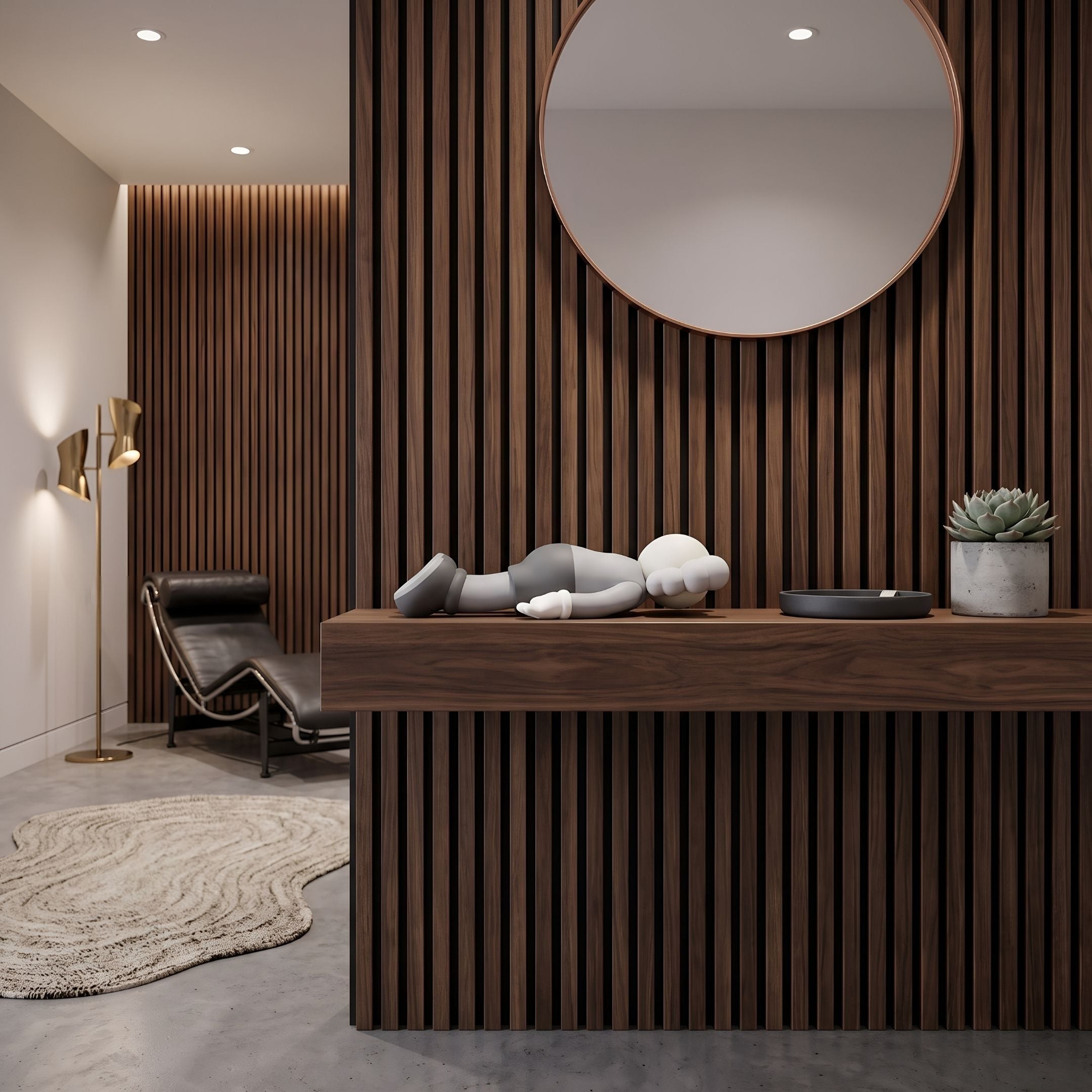 Soft Grey Iconify Flat Figure - 38cm lying on a wood-slatted console table beside a round mirror, succulent, and black leather lounge chair.