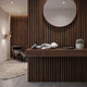 Soft Grey Iconify Flat Figure - 38cm lying on a wood-slatted console table beside a round mirror, succulent, and black leather lounge chair.