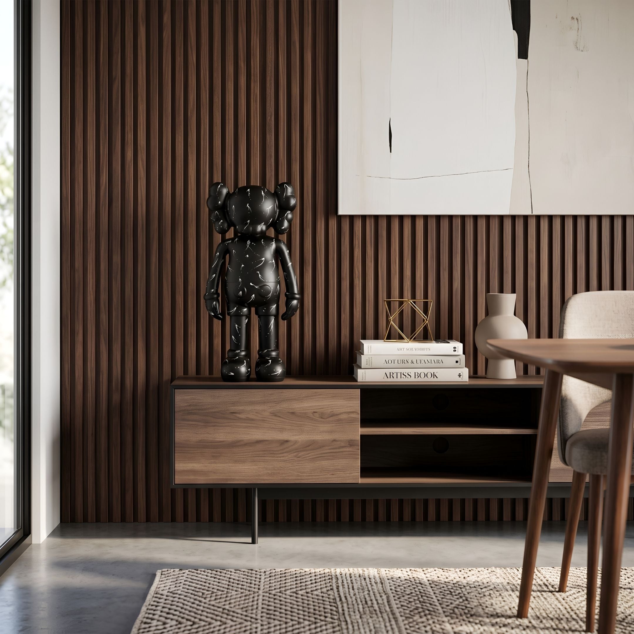 Black Stone Iconify Standing Sculpture - 70cm in matte black resin with white scratch-like marks, displayed on a wooden sideboard against a dark wood-paneled wall.