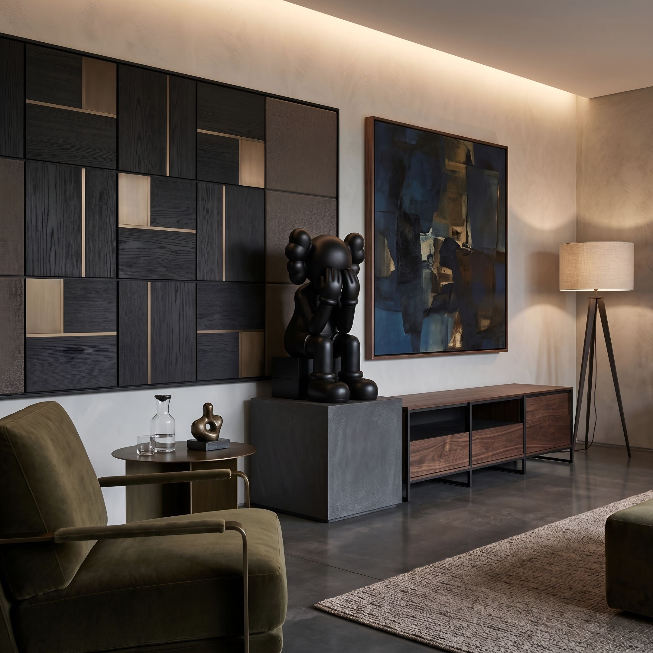 Midnight Black Iconify Melancholy Sitting Sculpture, 70cm, seated with face in hands on a grey pedestal beside a dark abstract painting and walnut media console.