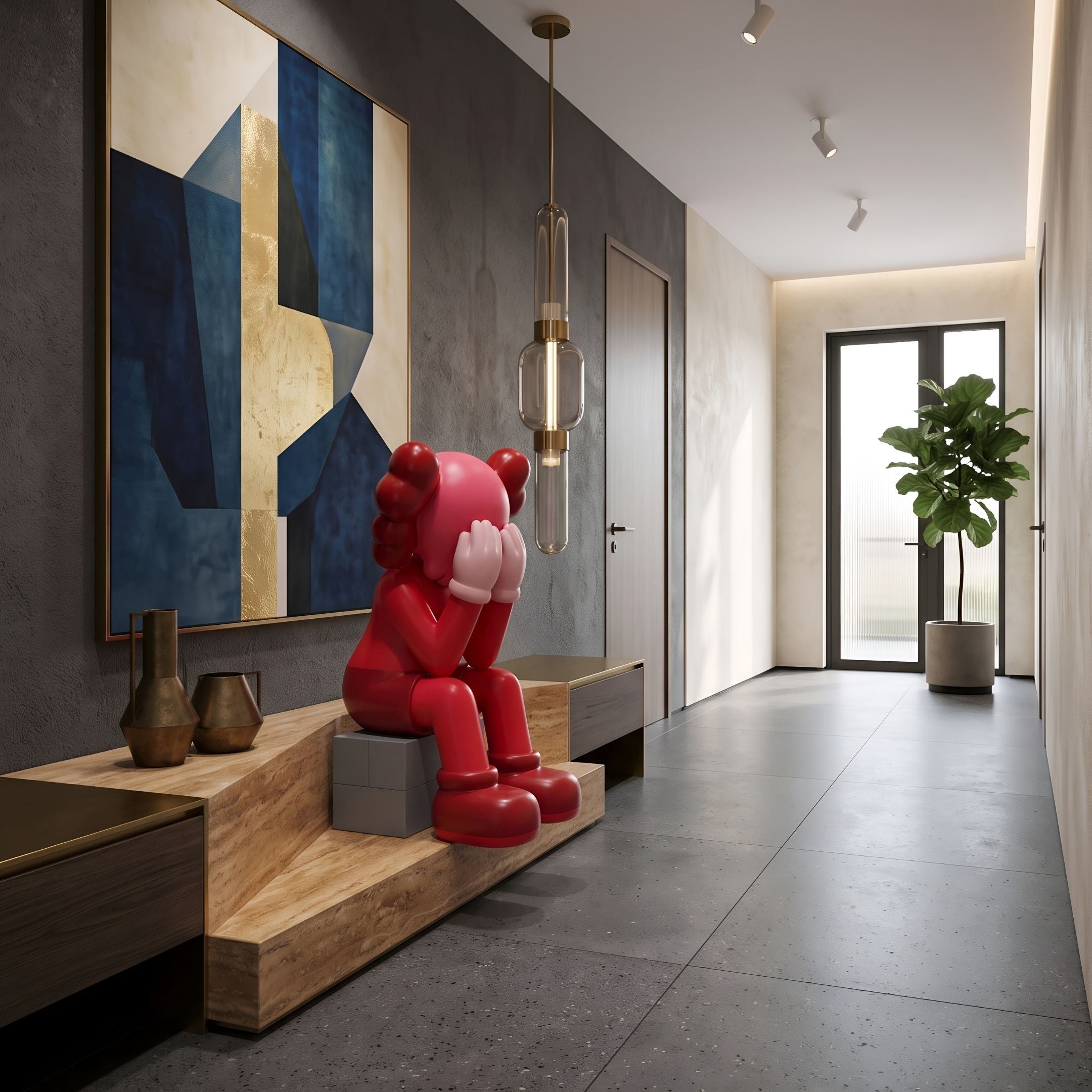 Blush Ruby Iconify Melancholy Sitting Sculpture, 70cm red resin figure with face-covering pose on a wood bench in a hallway setting with blue abstract art.