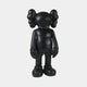 The Giant Sculptures Midnight Black Iconify Standing Sculpture - 70cm features a cartoonish figure with Xs for eyes, large hands and feet, rounded ears, and elongated limbs. Ideal as artistic decor, it stands upright on a plain white background, representing modern design.