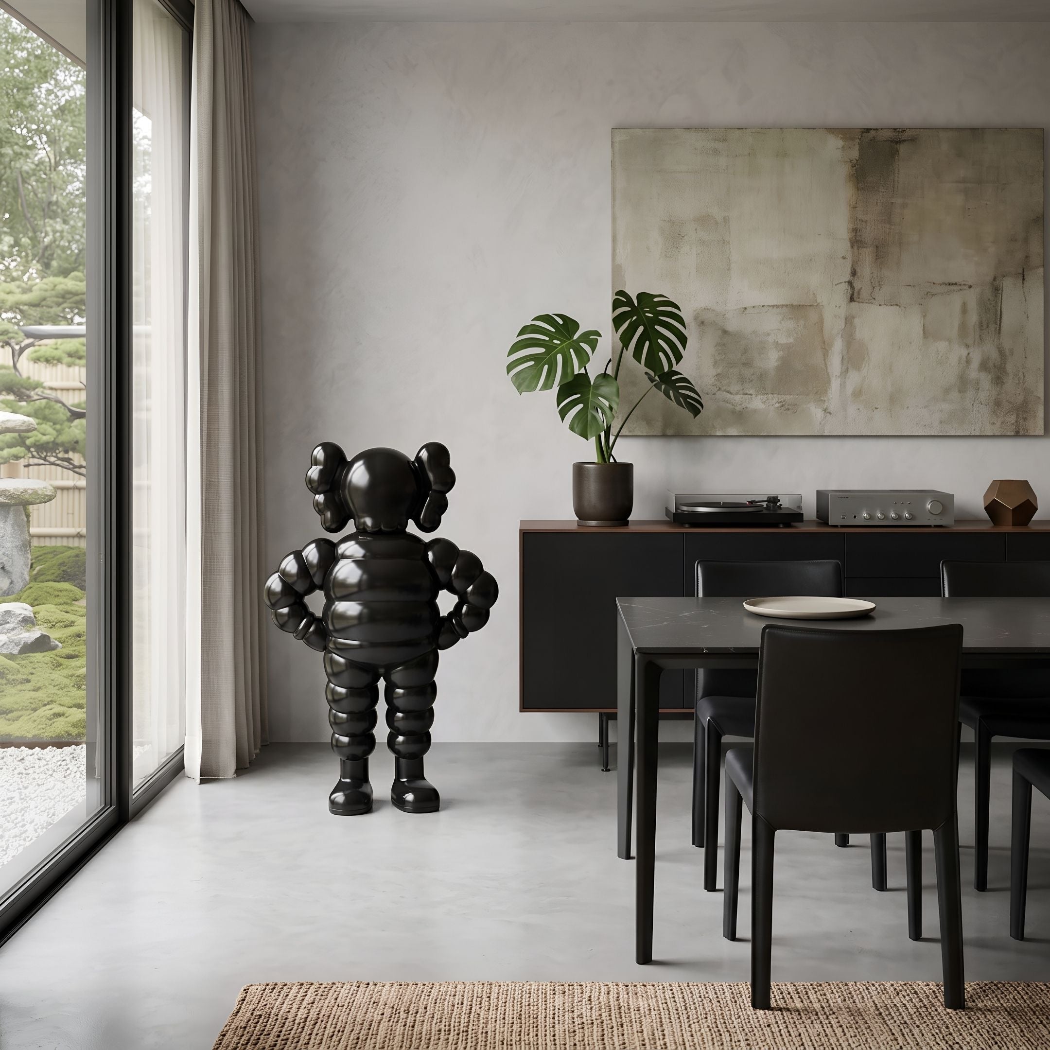 Midnight Black Iconify Rollo Warrior Sculpture, 80cm, hands-on-hips resin figure in a dining room beside a sideboard and abstract wall art.