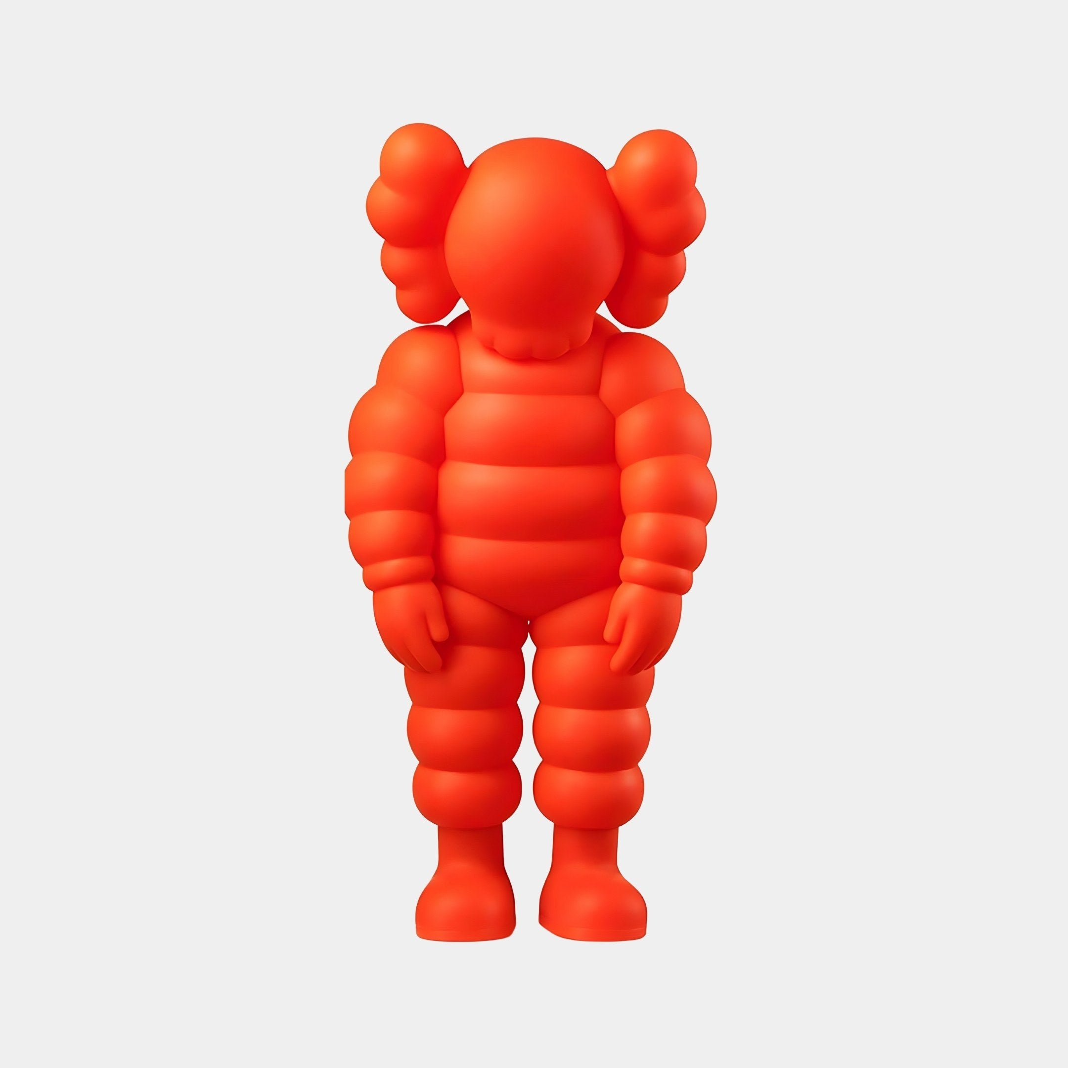 The Fiery Orange Iconify Rollo Sculpture - 80cm by Giant Sculptures is a cartoon-like figure displaying modern excellence, featuring a rounded body, large sphere-like ears, and segmented limbs. It stands upright on a plain white background.