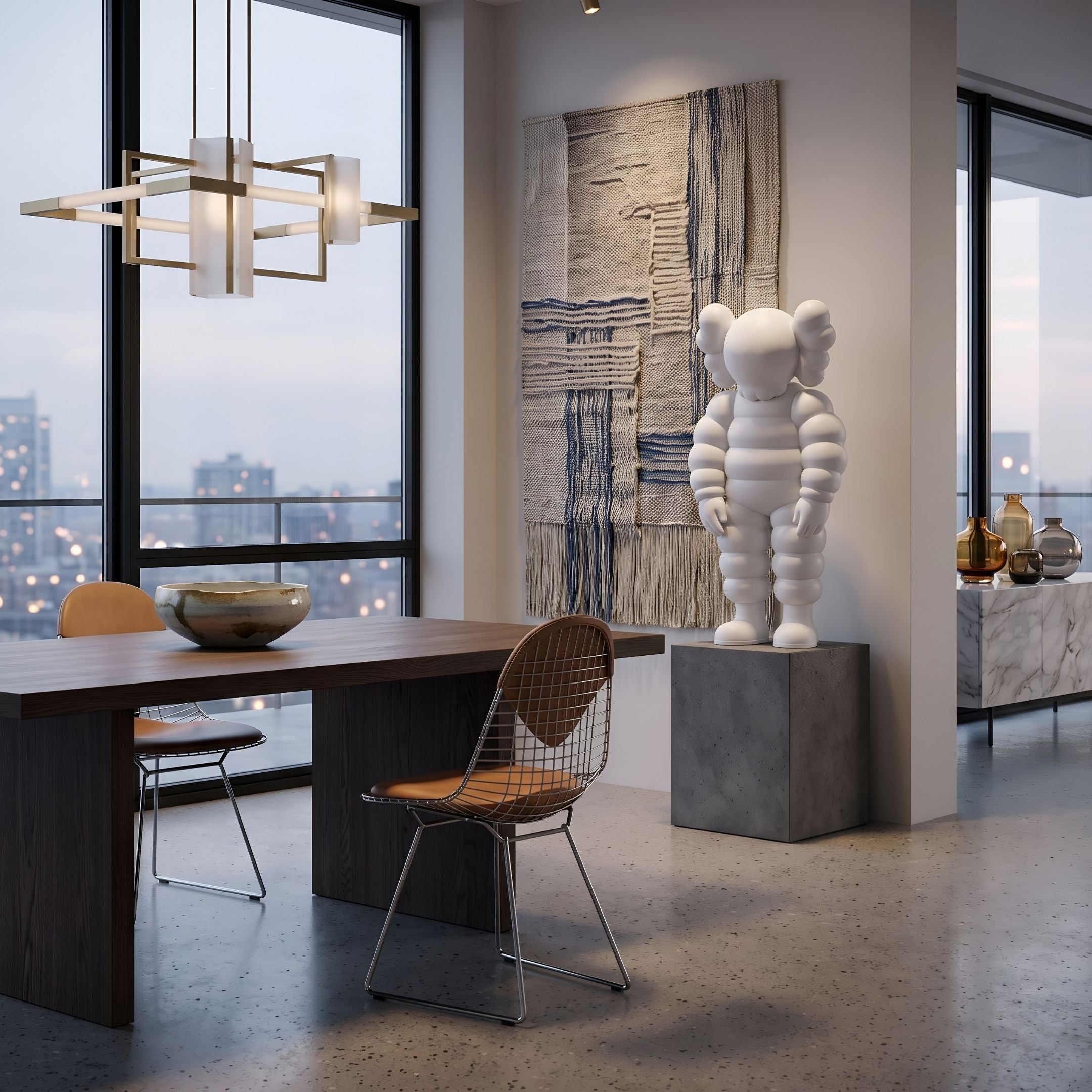 Cloud White Iconify Rollo Sculpture, 80cm resin figure on a grey pedestal in a modern dining room with woven wall art and city-view windows.