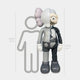 The Slate Grey Iconify Anatomy Sculpture by Giant Sculptures stands 187cm tall, dwarfing a 160cm person. Its split design features striking anatomical art on the right side, making this modern piece a standout in any space.