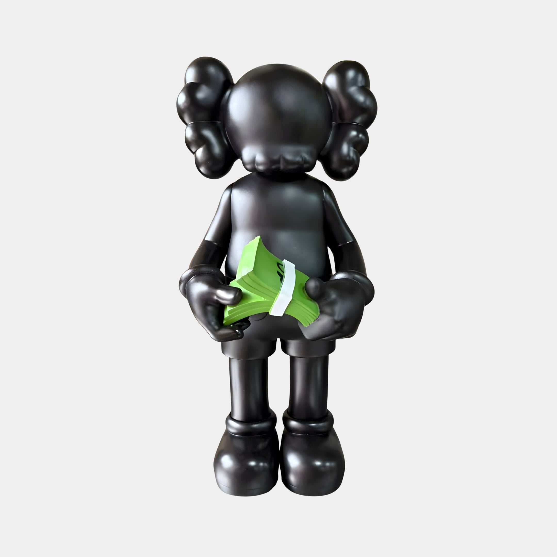 Midnight Black Iconify Dollars Figure 30cm by Giant Sculptures, a matte black polyvinyl character holding a green dollar stack, shown front-on against a light background.