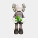 Driftwood Grey Iconify Dollars Figure 30cm by Giant Sculptures, standing front view holding a green stack of cash with both hands, on a plain light background.