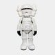The Black & White Iconify Enforcer Figure - 26cm by Giant Sculptures features a white, minimalist Stormtrooper-inspired design with oversized hands, feet, and head—ideal for contemporary art collections.
