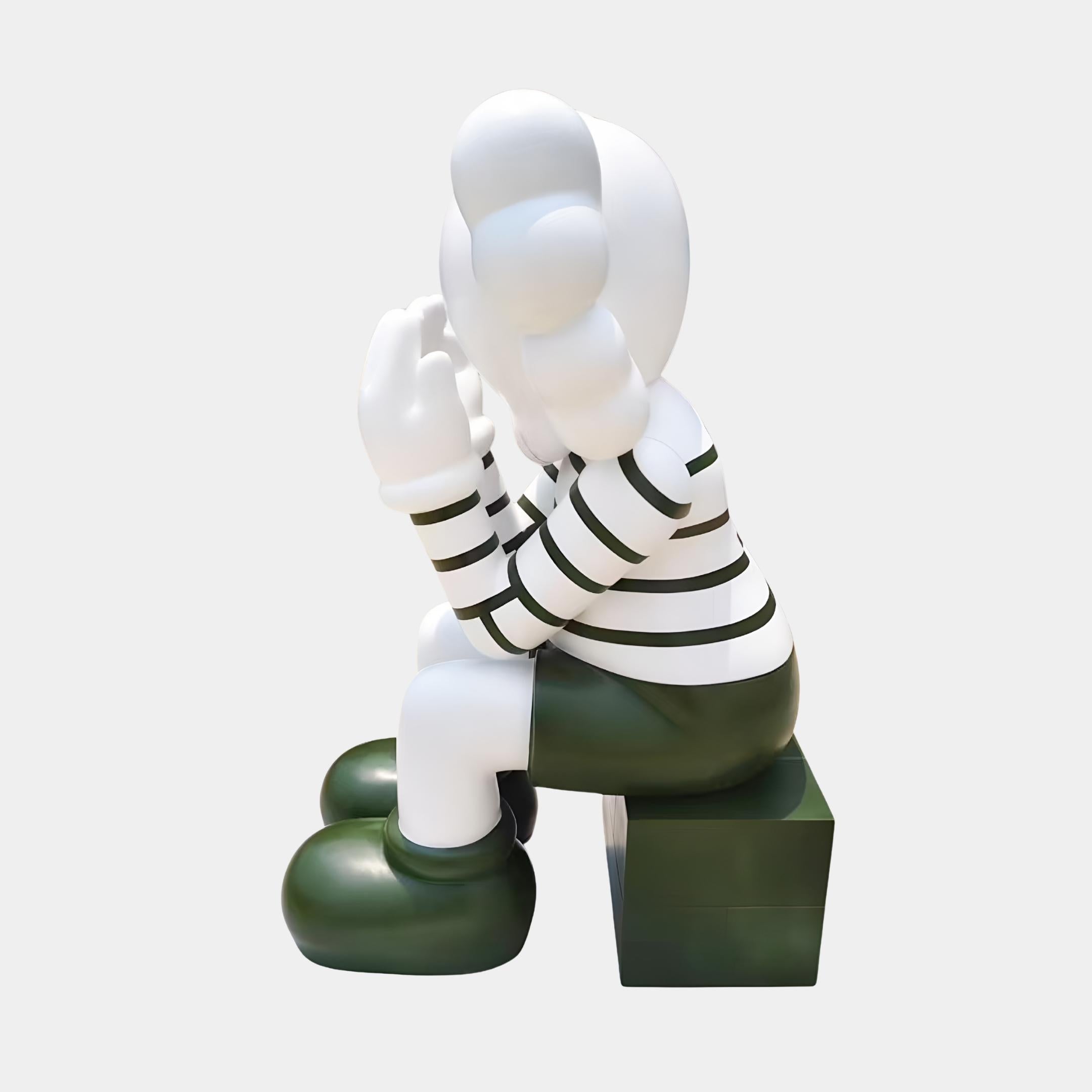 Left side view of the Forest Green Iconify Mime Sitting Sculpture - 135cm, showing the seated posture, black and white striped torso and matching forest green block base.