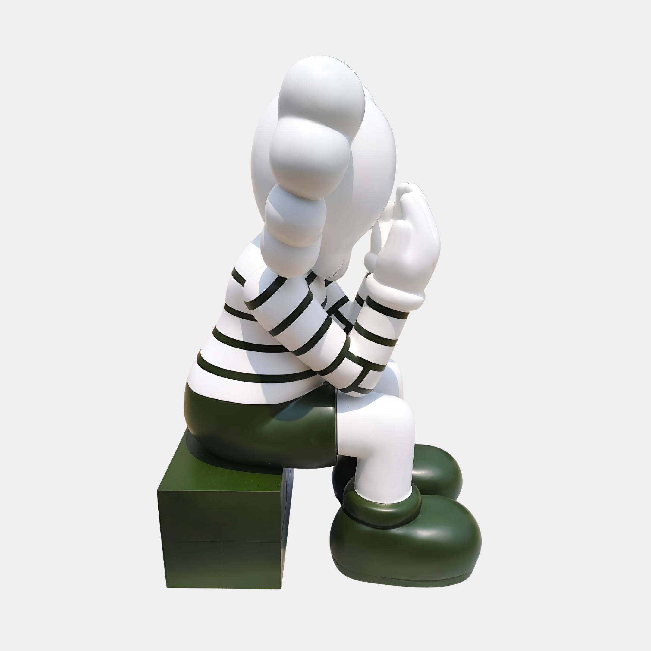 Right side view of the Forest Green Iconify Mime Sitting Sculpture - 135cm, showing the oversized forest green boots, striped sleeves and forest green block base.