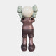 The Hazelnut Brown Iconify Silent Cry Sculpture (91cm) by Giant Sculptures features a stylized cartoon figure with gray puffy hair and hazelnut brown clothing, standing with hands covering its face—ideal for contemporary art decor.
