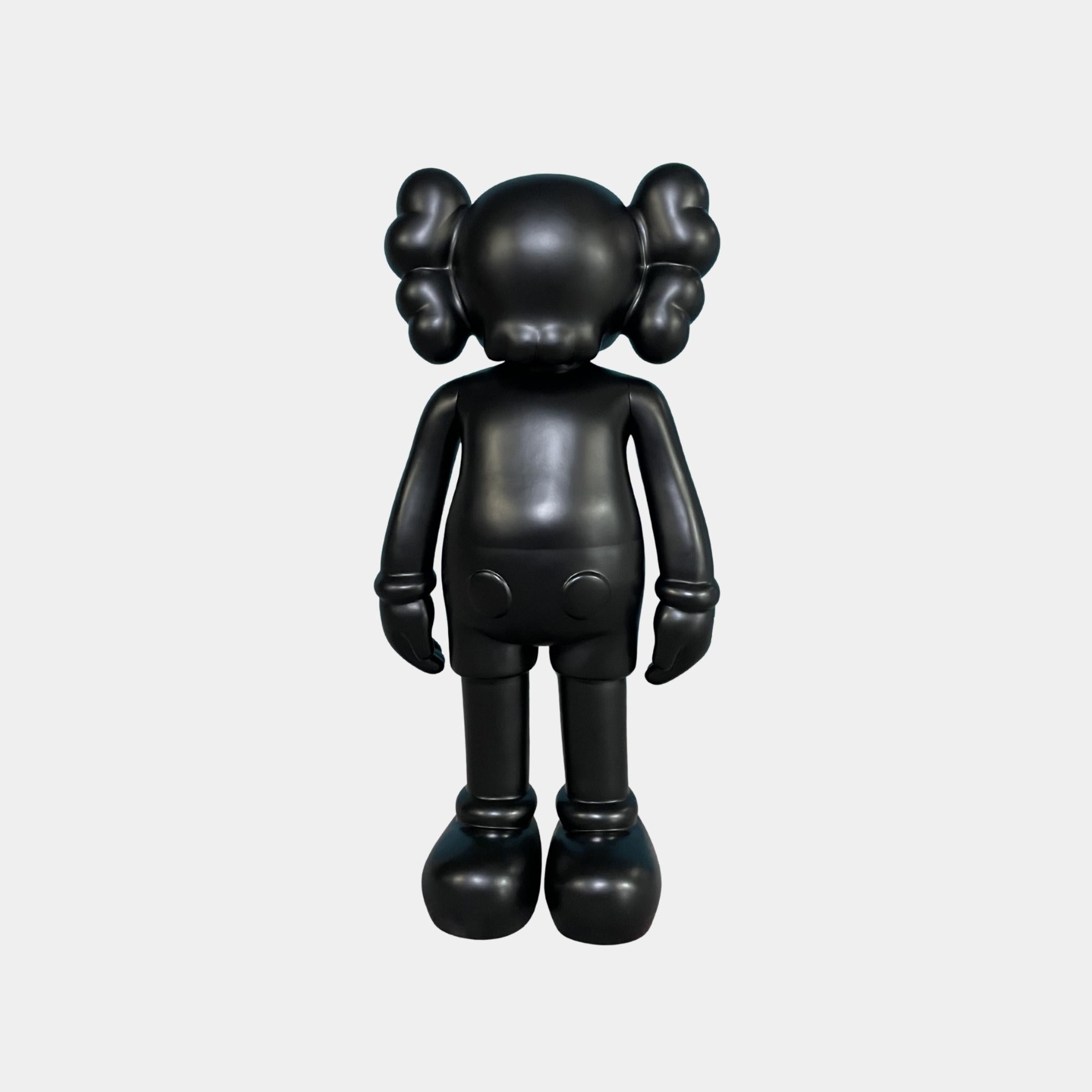 Midnight Black Iconify Standing Figure 20cm by Giant Sculptures, matte black cartoon character with large round ears and X-shaped eyes, shown against a plain white background.