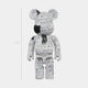 The Inkstorm Study Bear Sculpture - 70cm by Giant Sculptures features a white surface adorned with black, hand-drawn sketches and text, showcasing designer-toy craftsmanship as it stands upright against a plain light background.