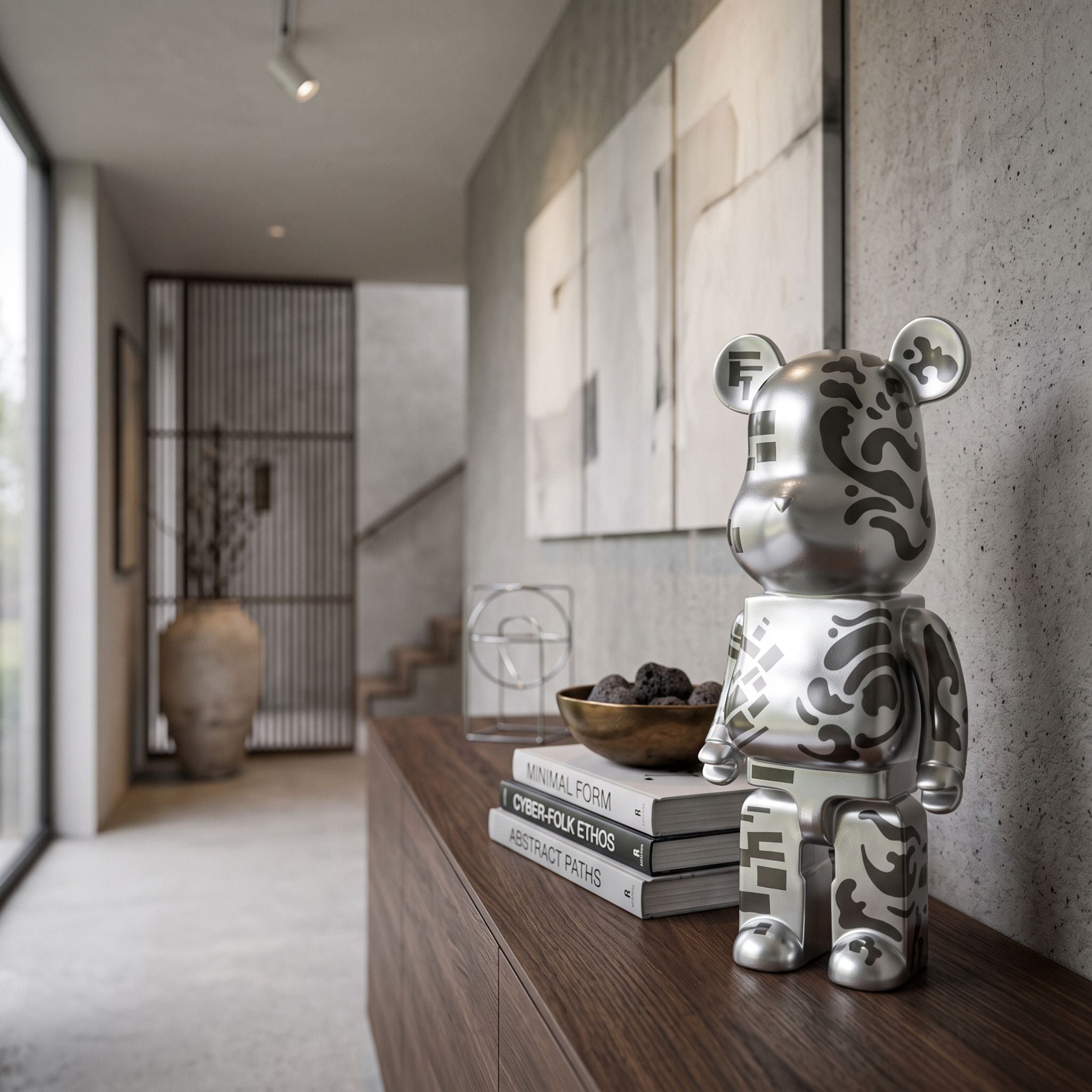 Inside Appears Outside 3 Bear Sculpture (50cm), silver electroplated finish with black abstract patterns, displayed on a wooden console in a hallway setting.