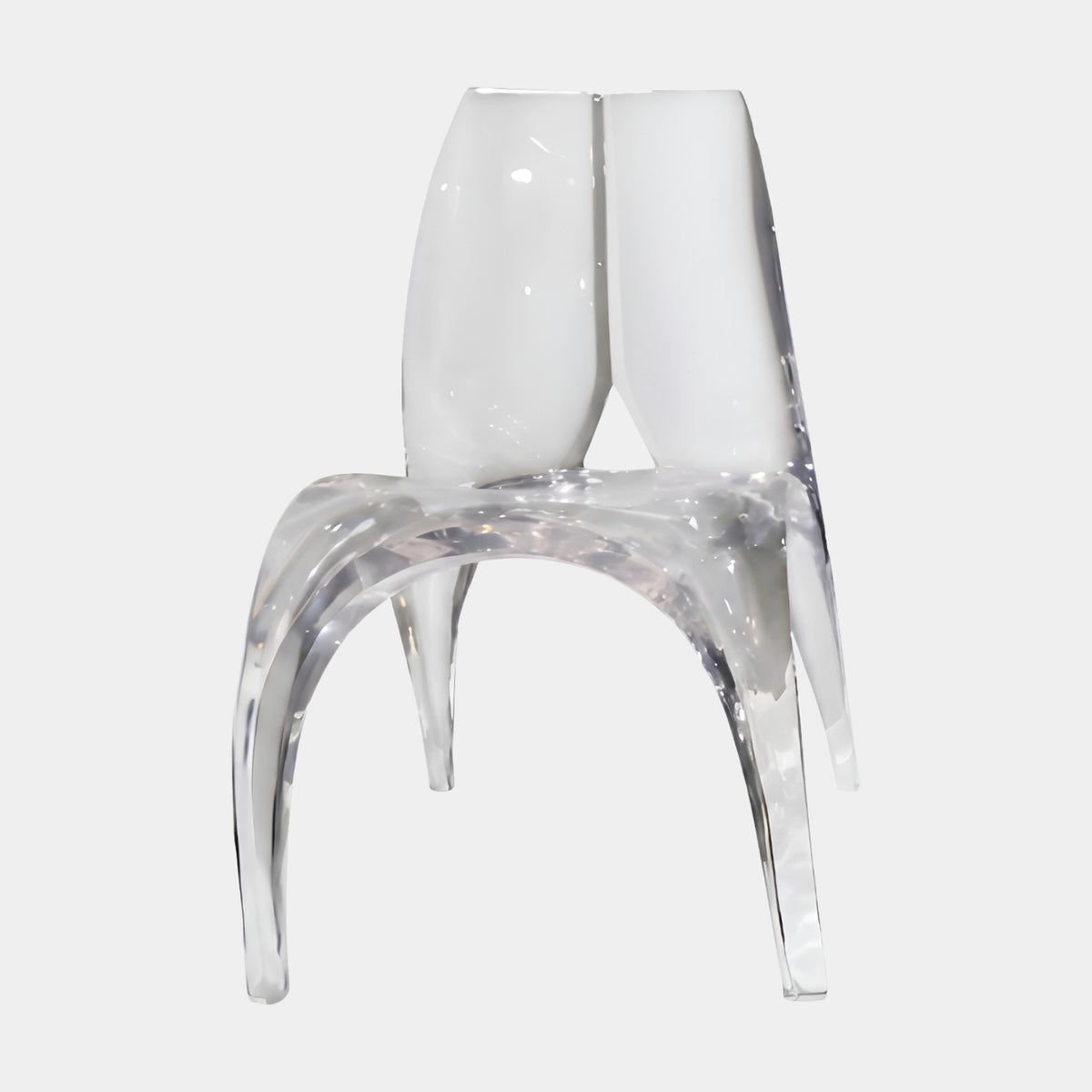 Clear Arched Leg Split Back Resin Chair (87cm) by Giant Sculptures, with arched legs and a tall split back, shown on a plain white background.
