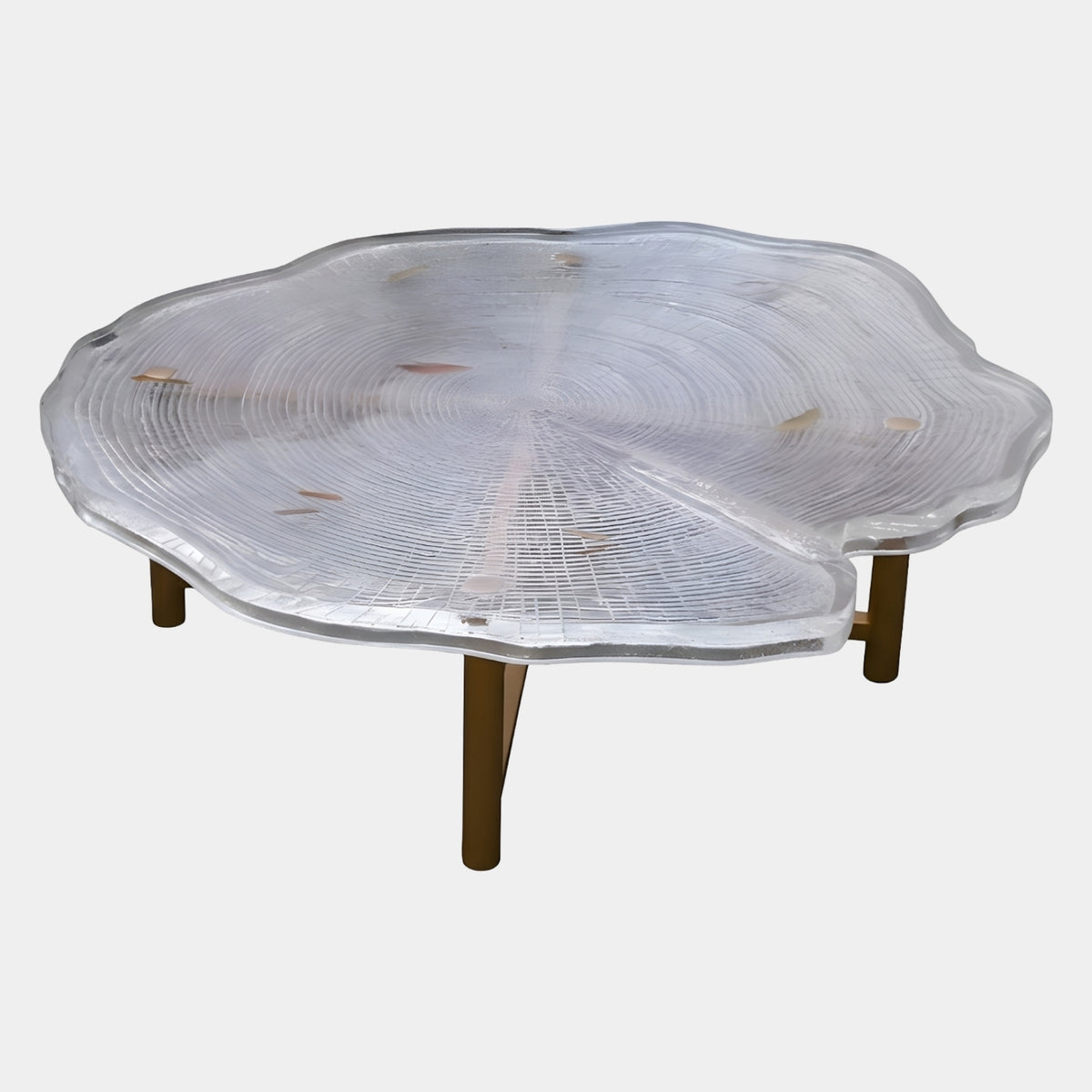 Clear Tree Ring Resin Coffee Table on Gold Legs, 140cm, showing a lobed clear resin top with carved growth rings on slender gold metal legs, plain white background.