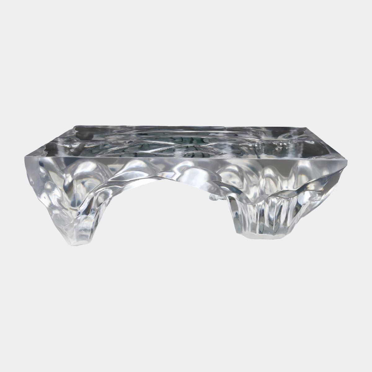 Colourless Folded Side Cast Resin Low Table (130cm) in clear resin, showing a level rippled top and deeply crumpled, arched sides, on a plain white background.