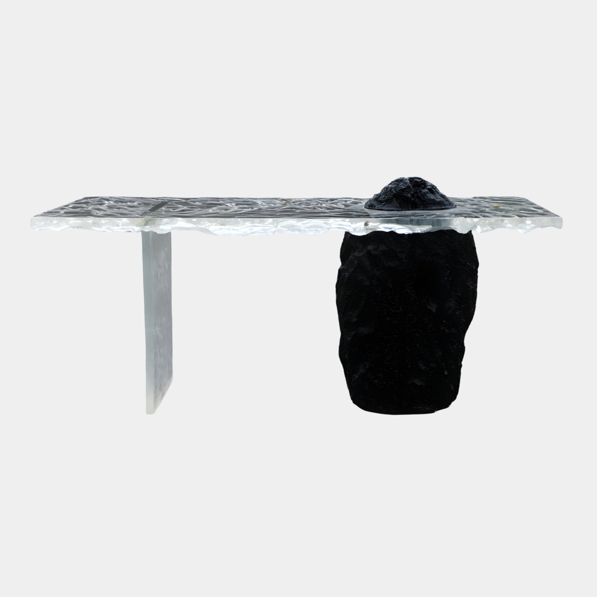 Torn Edge Slab & Rock Plinth Resin Console, 170cm, frosted clear textured resin top with torn edges on a black rock-form plinth and thin clear blade leg, plain white background.