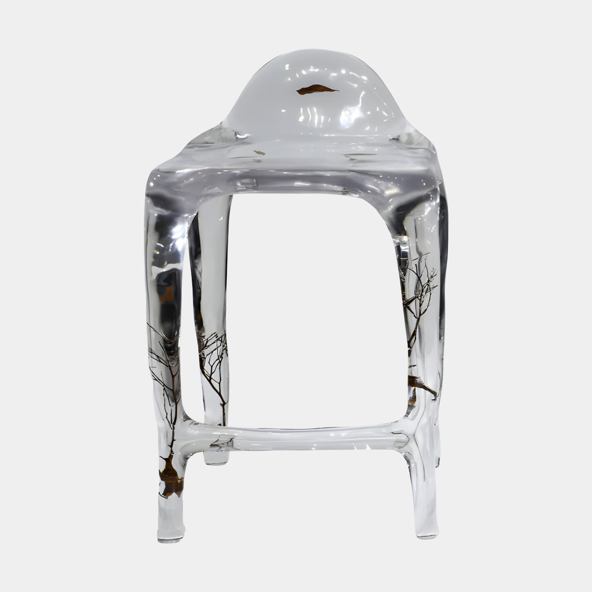 Clear Embedded Twig Cast Resin Bar Stool, 90cm, with domed back and rounded legs enclosing bare twigs and leaves, shown on a plain white background.