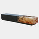 Black & Amber Lit Block Resin Bench, 280cm, matt black body with a marbled amber, white and rust resin end, on a recessed base, shown on a plain white background.