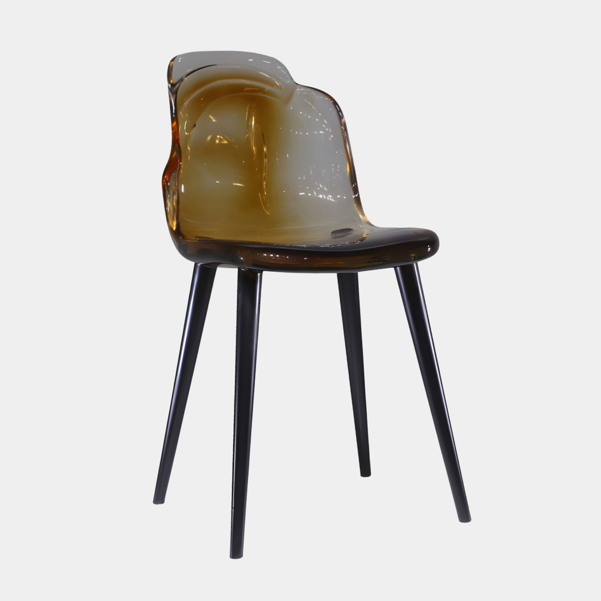 Amber Shell Black Leg Cast Resin Dining Chair, 85cm, with a translucent honey-toned resin seat and back on slender matte black metal legs, shown on a plain white background.