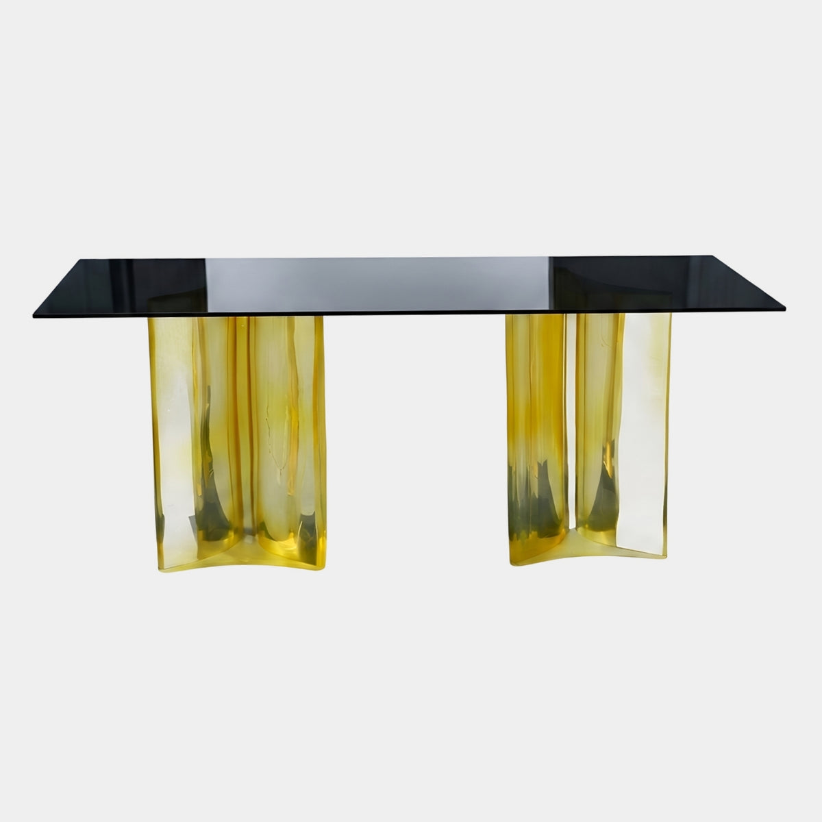 Yellow Channelled Pedestal Smoked Glass Console, 190cm, with cruciform amber-yellow resin pedestals and a rectangular smoked glass top on a plain white background.