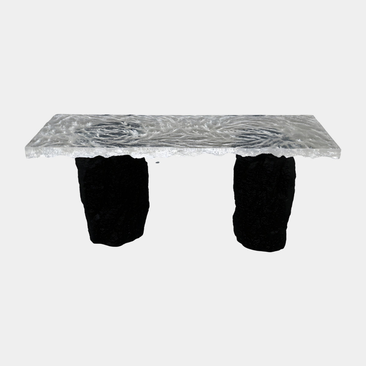 Clear Frost Swirl Slab Black Rock Leg Dining Table - 180cm with a swirled clear resin top on two rough black rock-form pillars, shown on a plain white background.