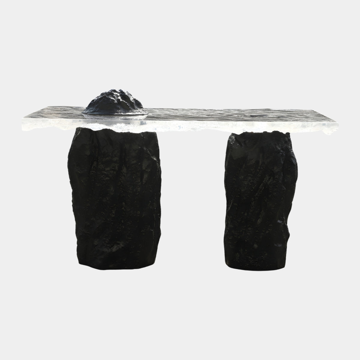 Clear Rippled Slab Twin Black Rock Pillar Console - 140cm, with a black dome on the rippled resin top, set on two rough black rock pillars, plain white background.