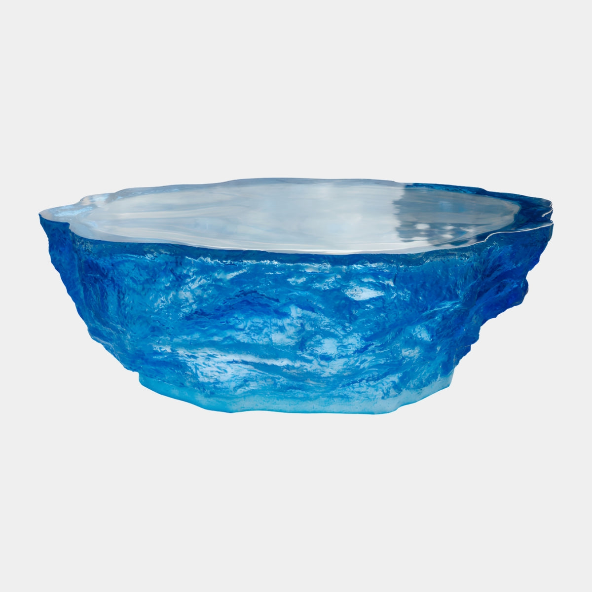 Blue Churned Ice Block Cast Resin Low Table, 120cm, with a smooth pale top and rough textured blue sides, shown on a plain white background.