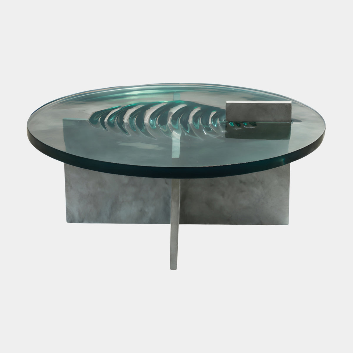 Green Set Vane Disc Cast Resin Low Table, 90cm, round green-tinted resin top with curved vanes and a grey block, on a grey base, shown on a plain white background.