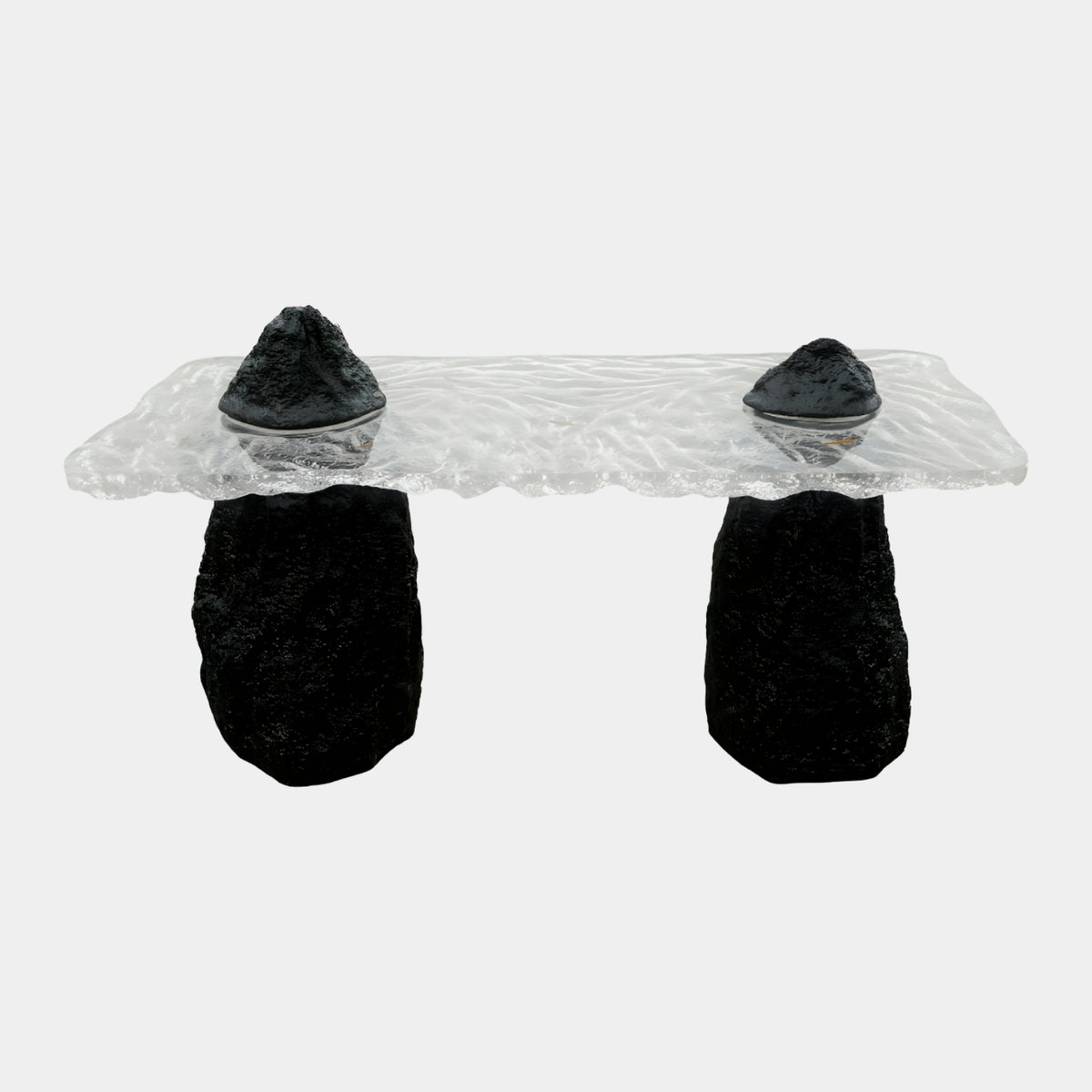 Clear Slab Twin Rock & Peak Resin Console (160cm) by Giant Sculptures, with a rippled clear slab on two black rock bases and matching peaks rising through the top, on a plain white background.