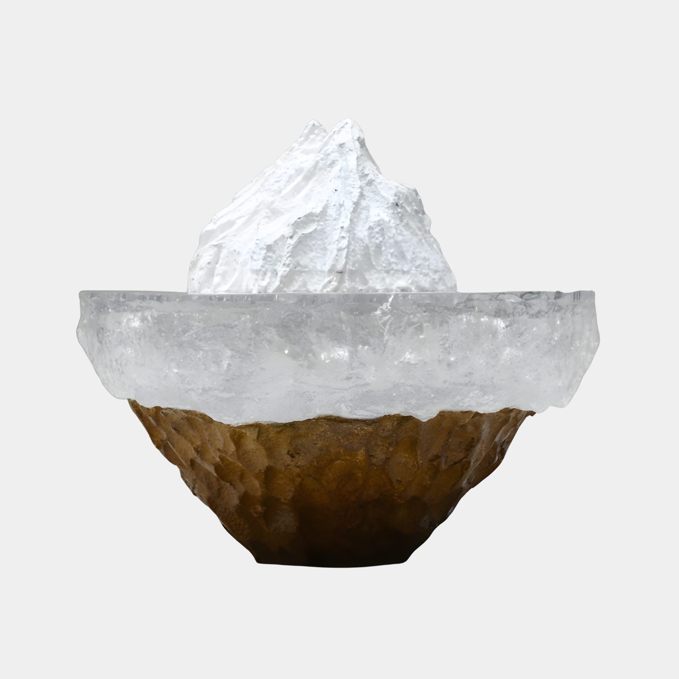 White Crystal Resin Mountain on Textured Bowl by Giant Sculptures, frosted peak rising from a clear icy rim above a rugged bronze-earth base, on a white background.