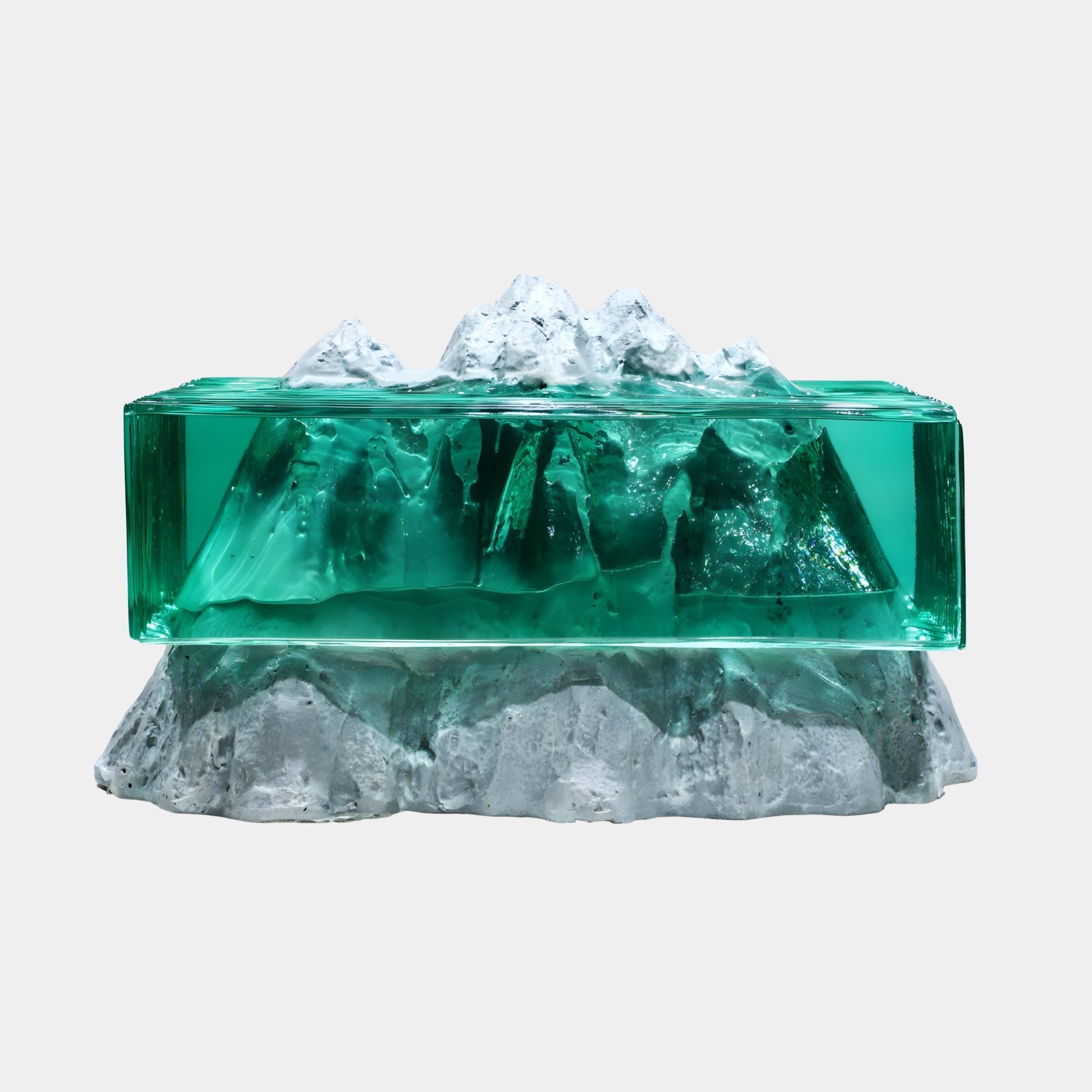 Emerald Glass Block Triple Peak Snow Resin Console by Giant Sculptures, showing a green resin sea with white sculpted mountain peaks on a frosted base.