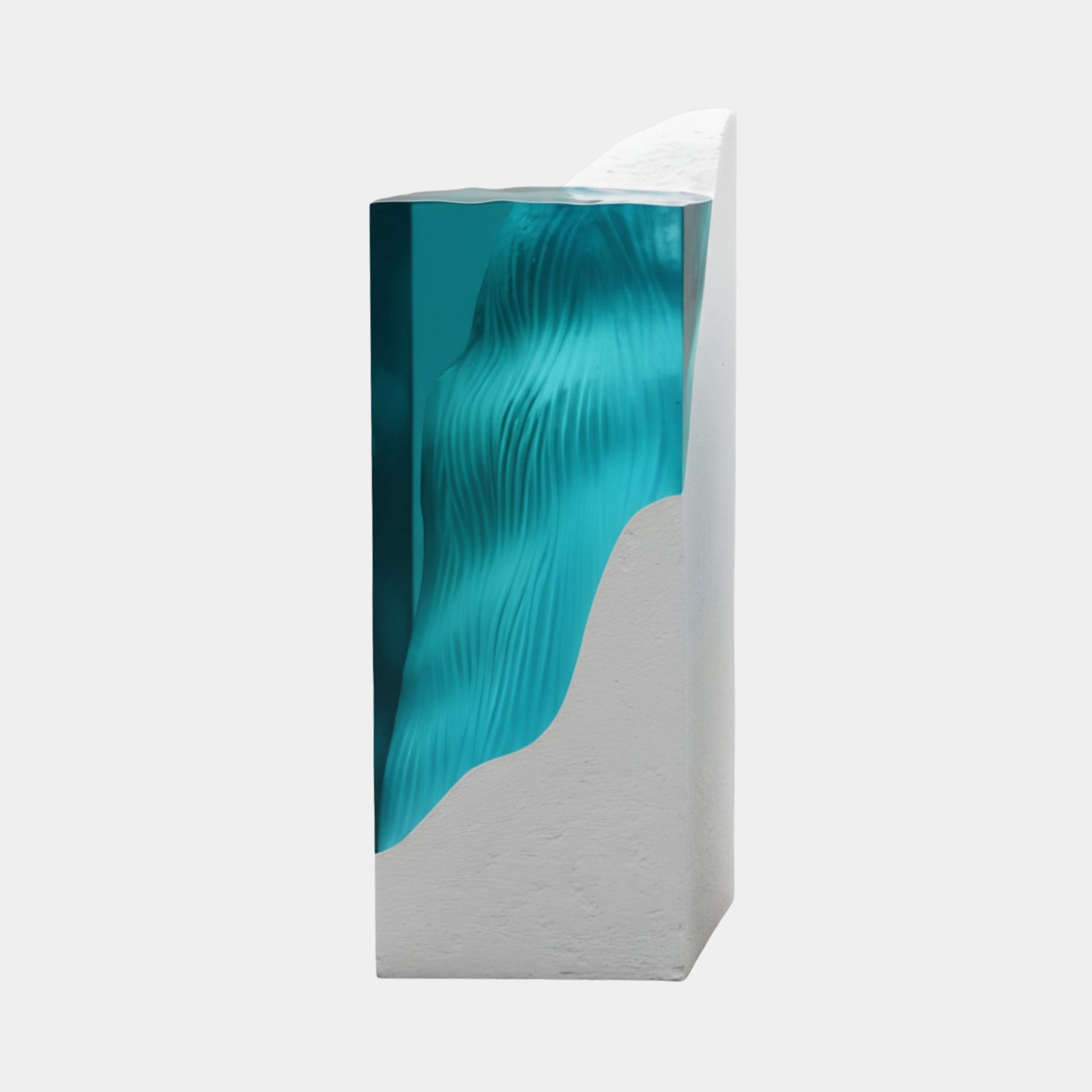 Giant Sculptures Teal Resin Wave on White Panel Sculpture 115cm, a tall fibreglass column with a glassy teal wave flowing above a white base, on a plain background.