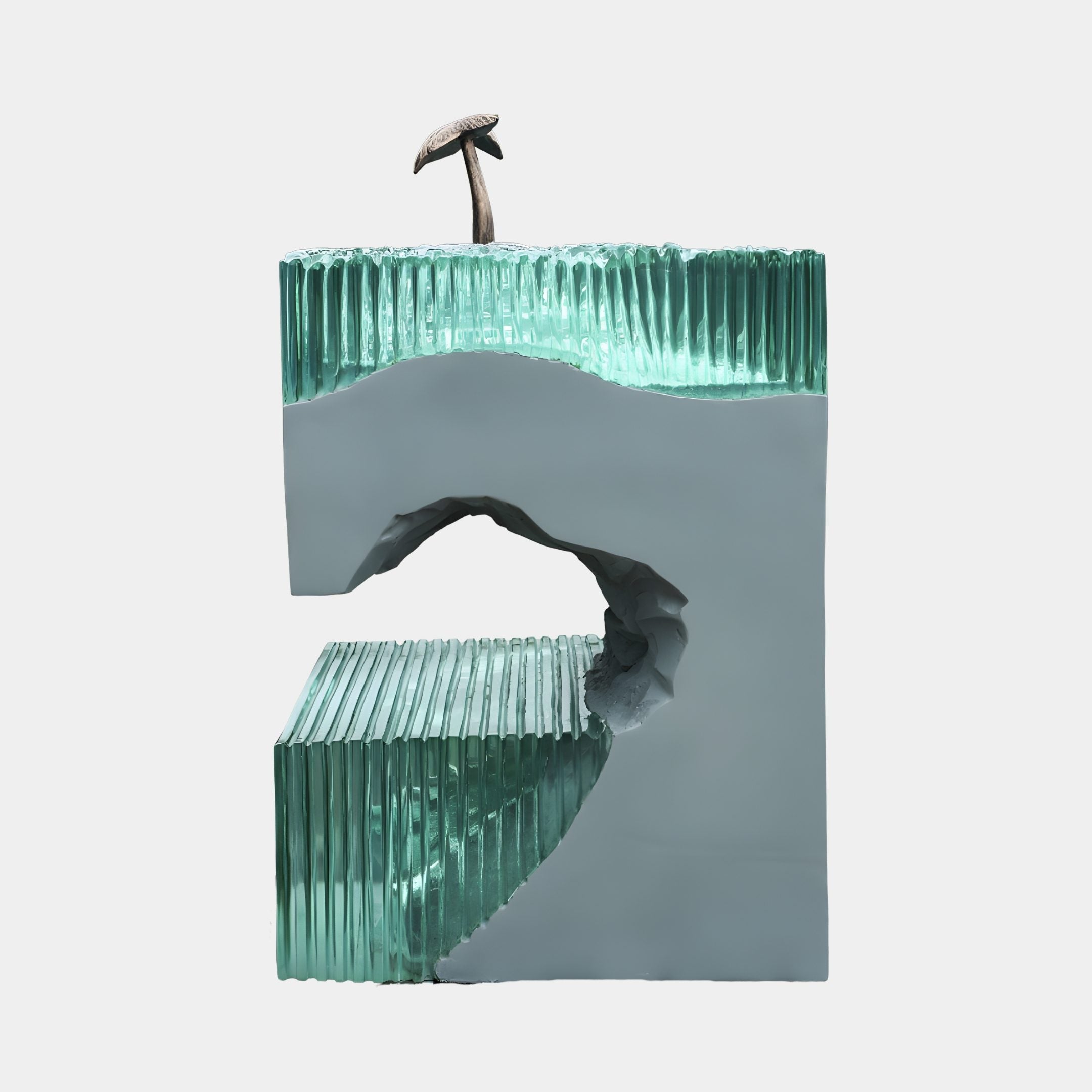 Clear Fluted Resin Cavern Mushroom Motif Sculpture by Giant Sculptures, a green ribbed resin block with a grey carved arch and bronze mushroom on top.