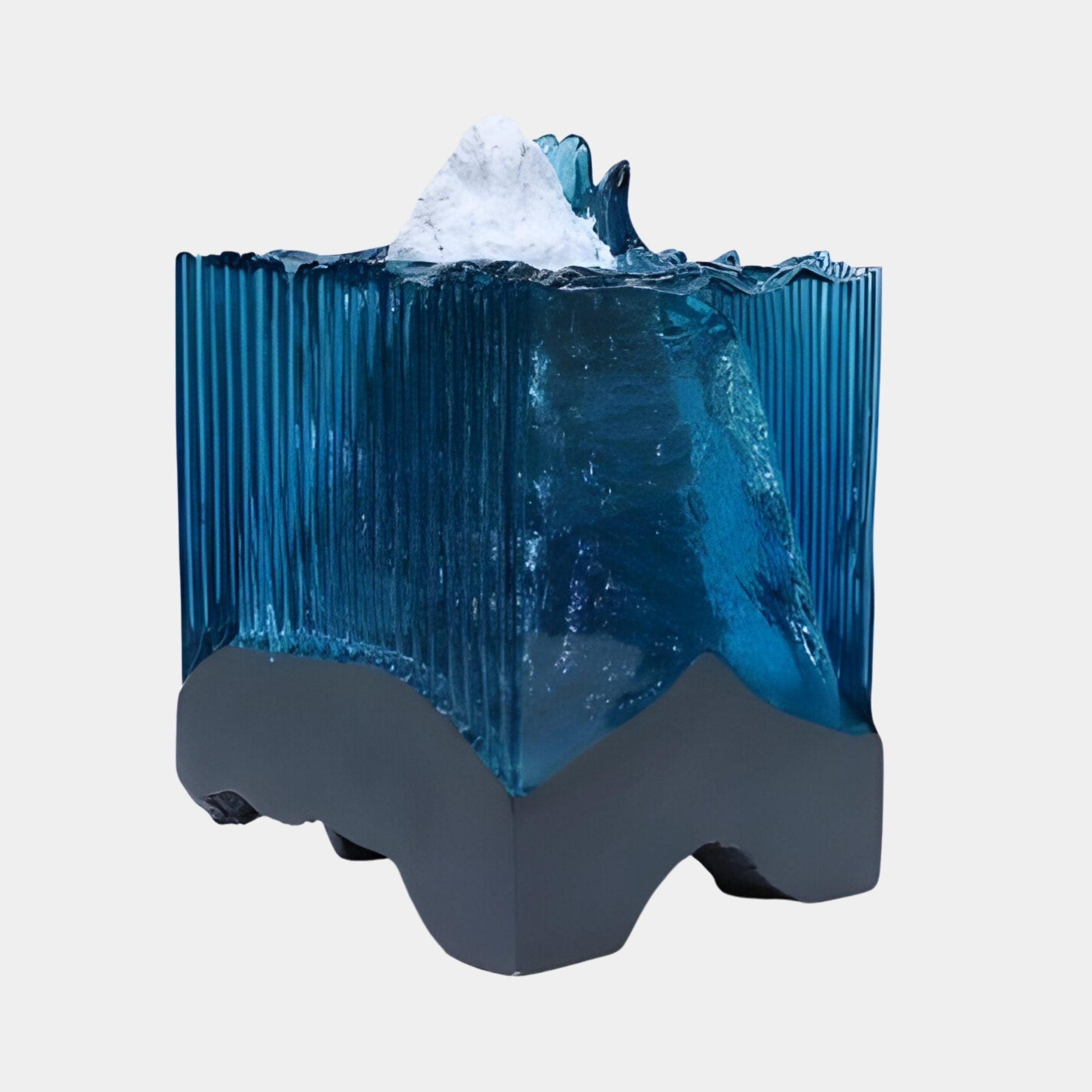 Blue Ribbed Resin Flowing on Charcoal Base Sculpture 55cm by Giant Sculptures, with a ribbed turquoise crest and snowy peak above a dark grey base.