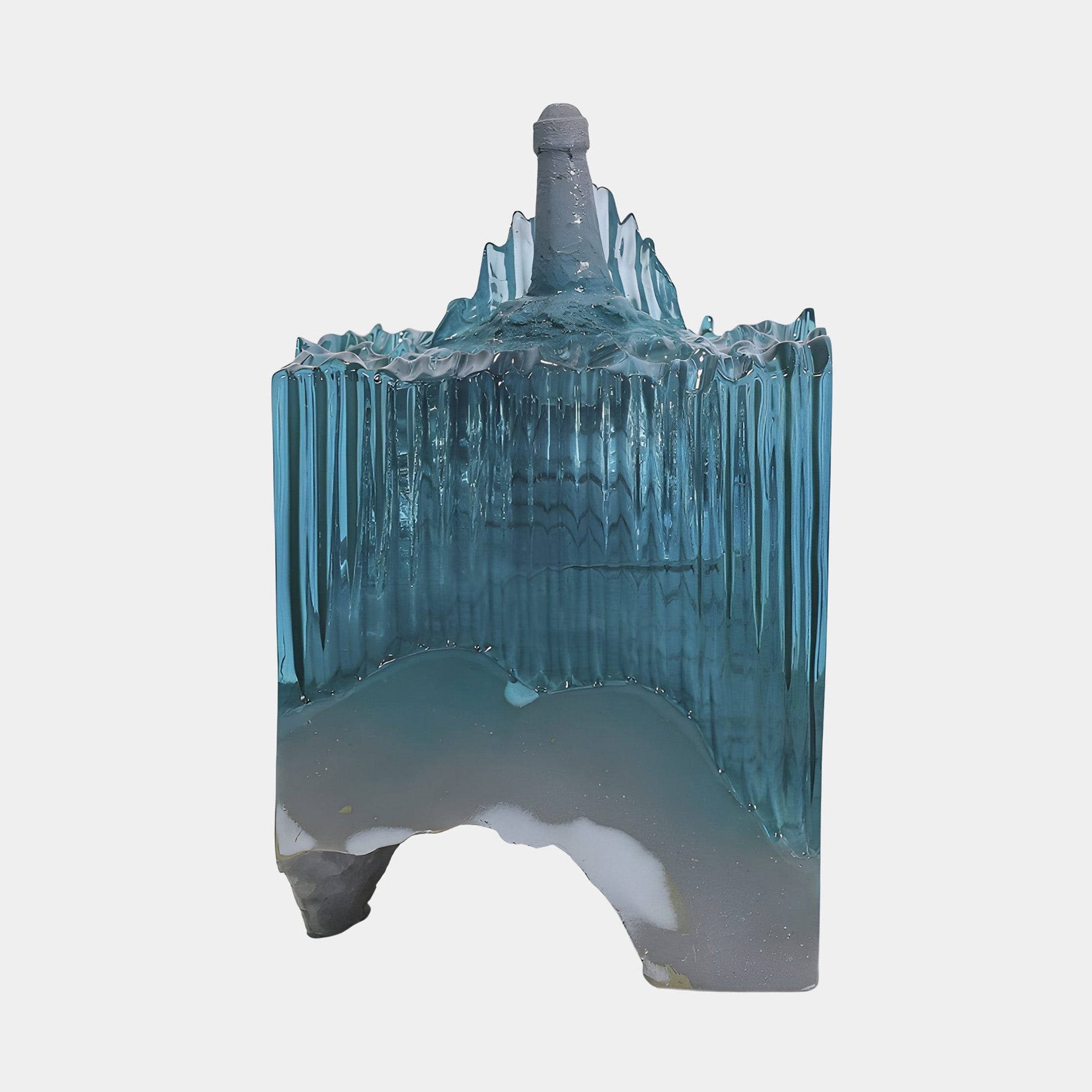 Aqua Ribbed Sea Grey Lighthouse Motif Resin Sculpture by Giant Sculptures, 32cm, with turquoise ribbed water and a grey cliff topped by a lighthouse, on a plain background.