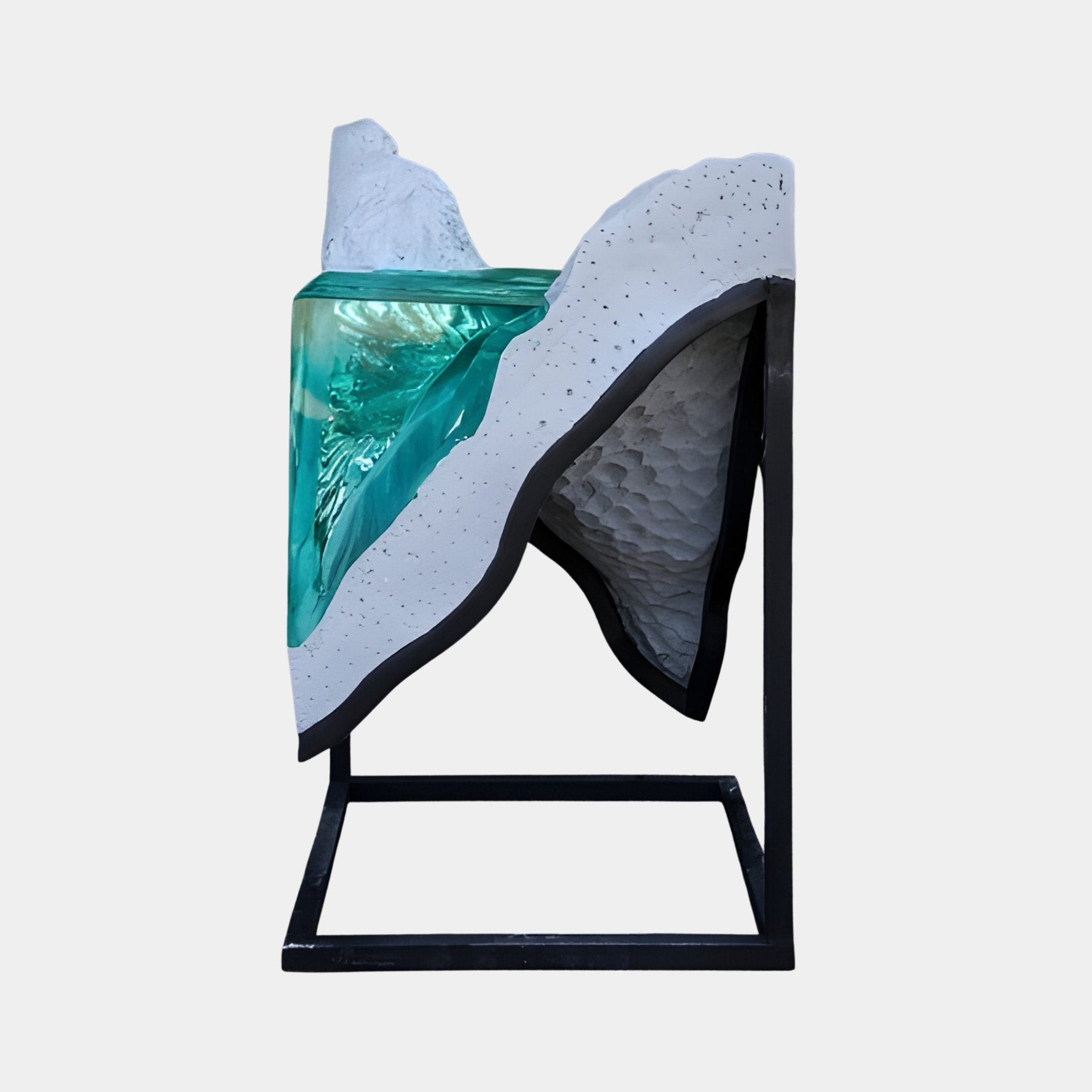 Giant Sculptures Teal Glacial Wave Resin sculpture 76cm with turquoise resin curl and white fibreglass crest, set in a slim black steel frame on a plain background.