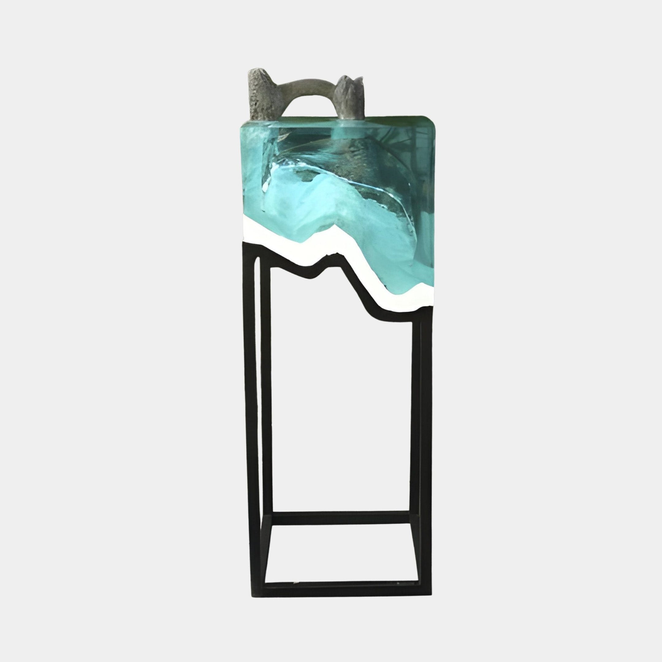 Glacier Teal Resin in Metal Frame Sculpture 117cm by Giant Sculptures, teal and white wave panel with stone-like top mounted in a slim black frame.