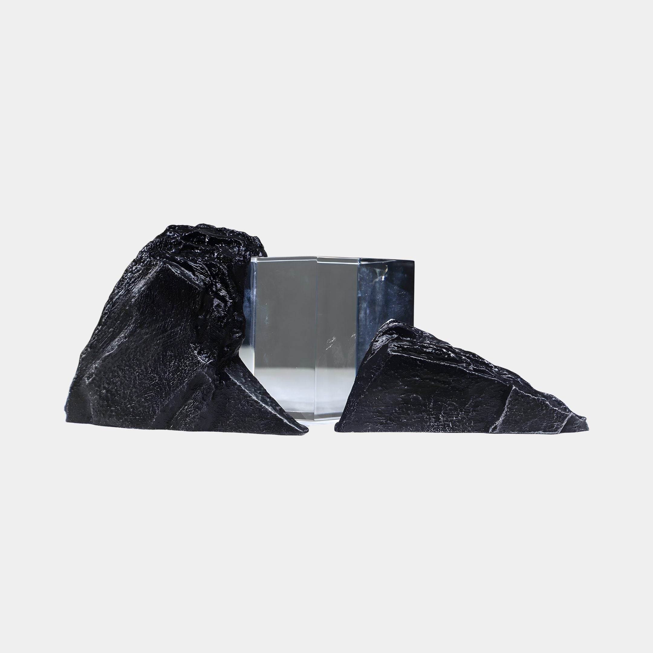 Giant Sculptures Black Rock with Clear Resin Fragment Sculpture 50cm, a textured black boulder split by a transparent glass-like block, shown on a plain background.