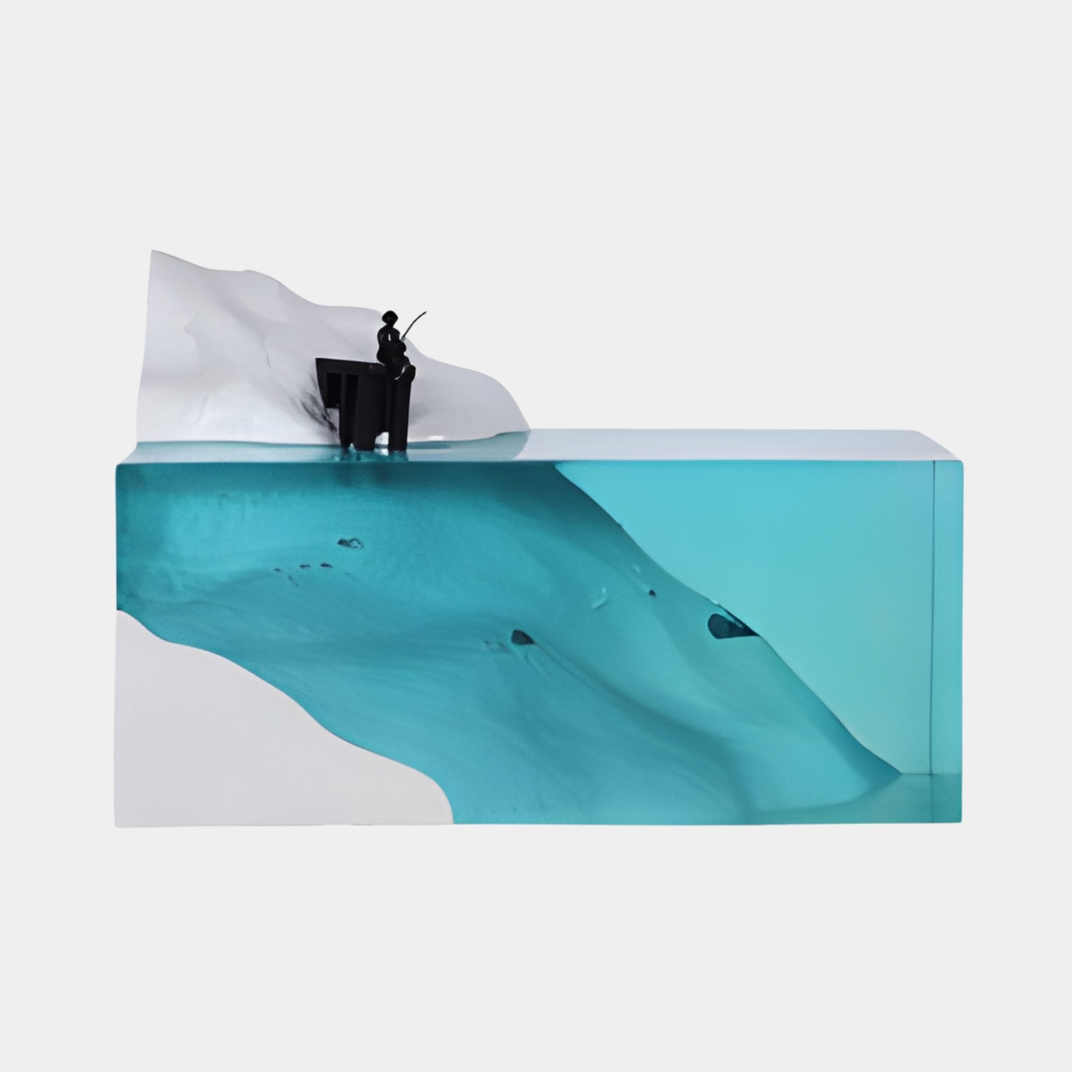 Teal Blue Fisherman Iceberg Diorama Resin Sculpture by Giant Sculptures, showing a tiny figure fishing atop a white shore above turquoise resin sea, on a plain background.