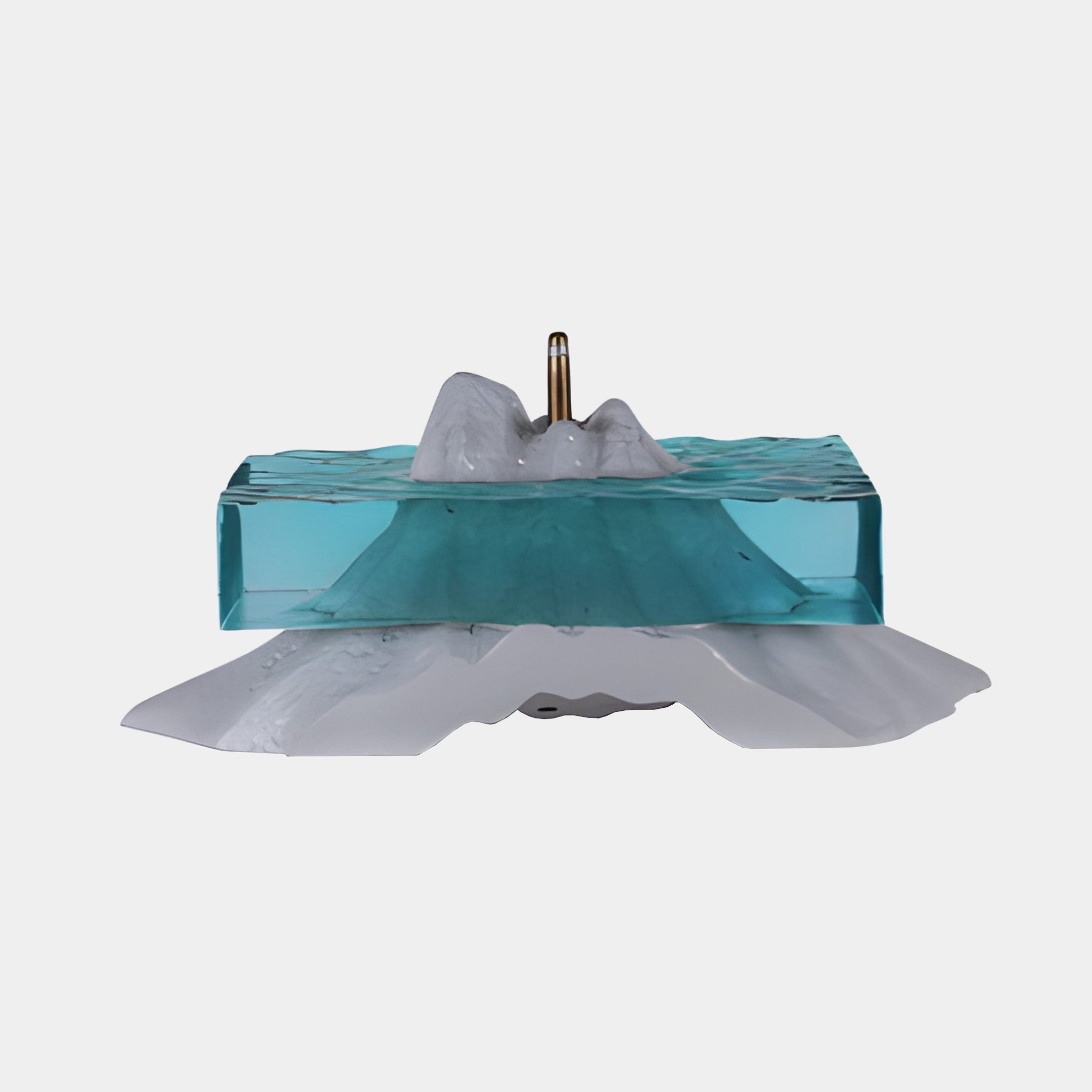 Giant Sculptures Teal Resin Ocean Mountain Block Sculpture 70cm shown from the side, with a grey-white peak rising through a clear teal resin sea on a plain background.