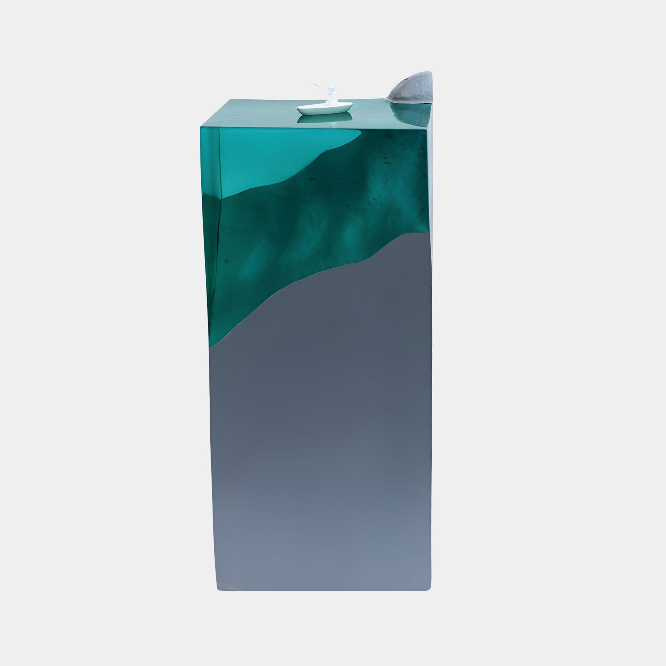 Giant Sculptures' 80cm Teal Resin Mountain Column on Grey Pillar Sculpture with a tiny white boat and rock at the summit, shown against a plain light background.