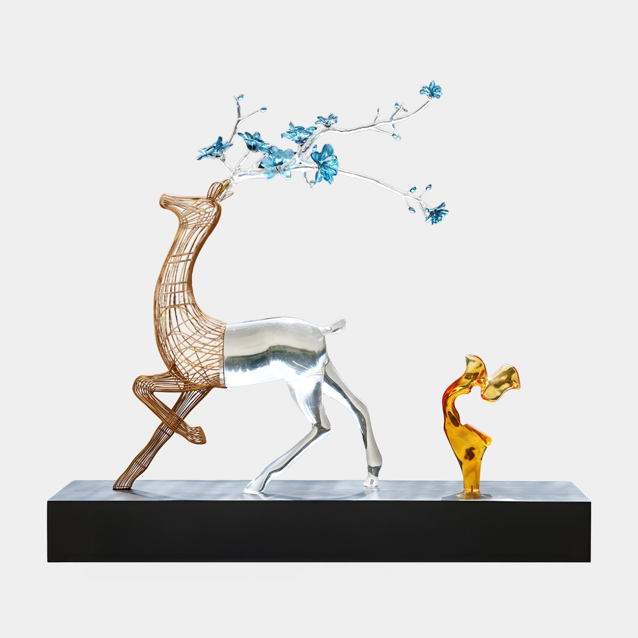 Giant Sculptures' 180cm Gold Wireframe & Clear Floral Antler Deer striding forward with blue blossom antlers beside a small amber figure on a black base.