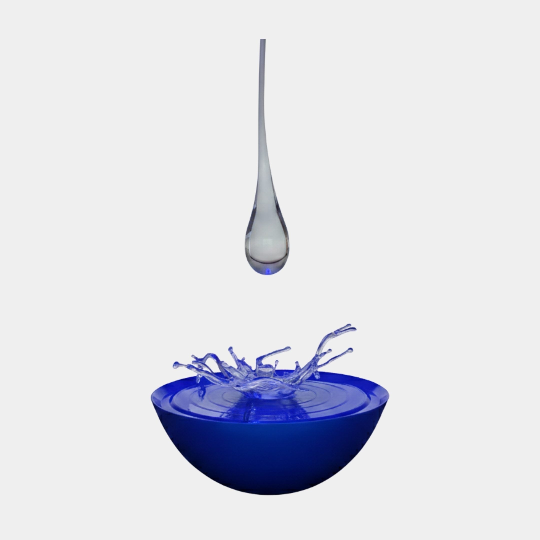 Blue Hanging Water Drop & Kinetic Splash Resin Sculpture by Giant Sculptures, with a clear suspended droplet above a cobalt splash bowl on a plain background.