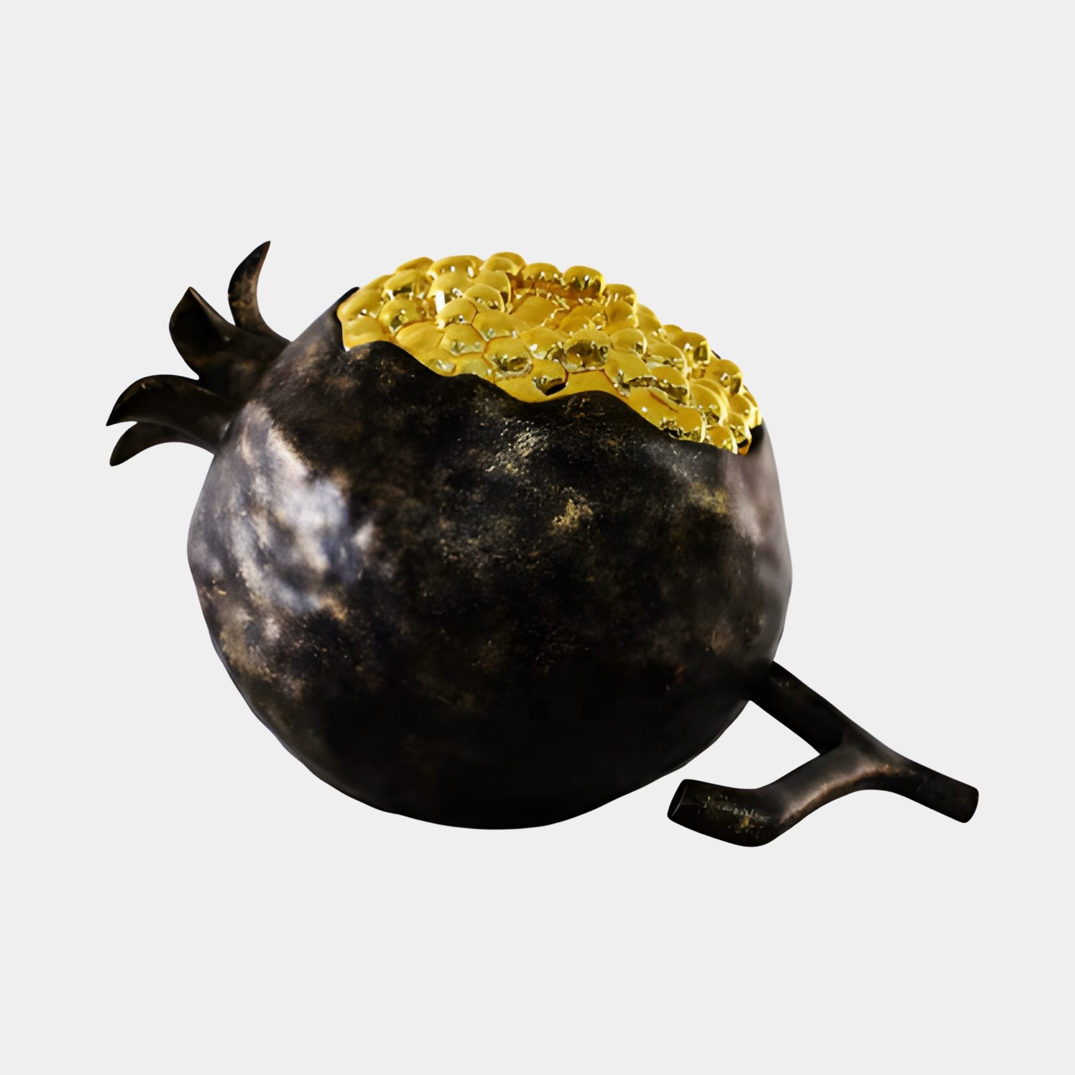 Dark Bronze and Golden Seeded Pomegranate resin sculpture by Giant Sculptures, split open to reveal gilded seeds, shown on a plain light background.