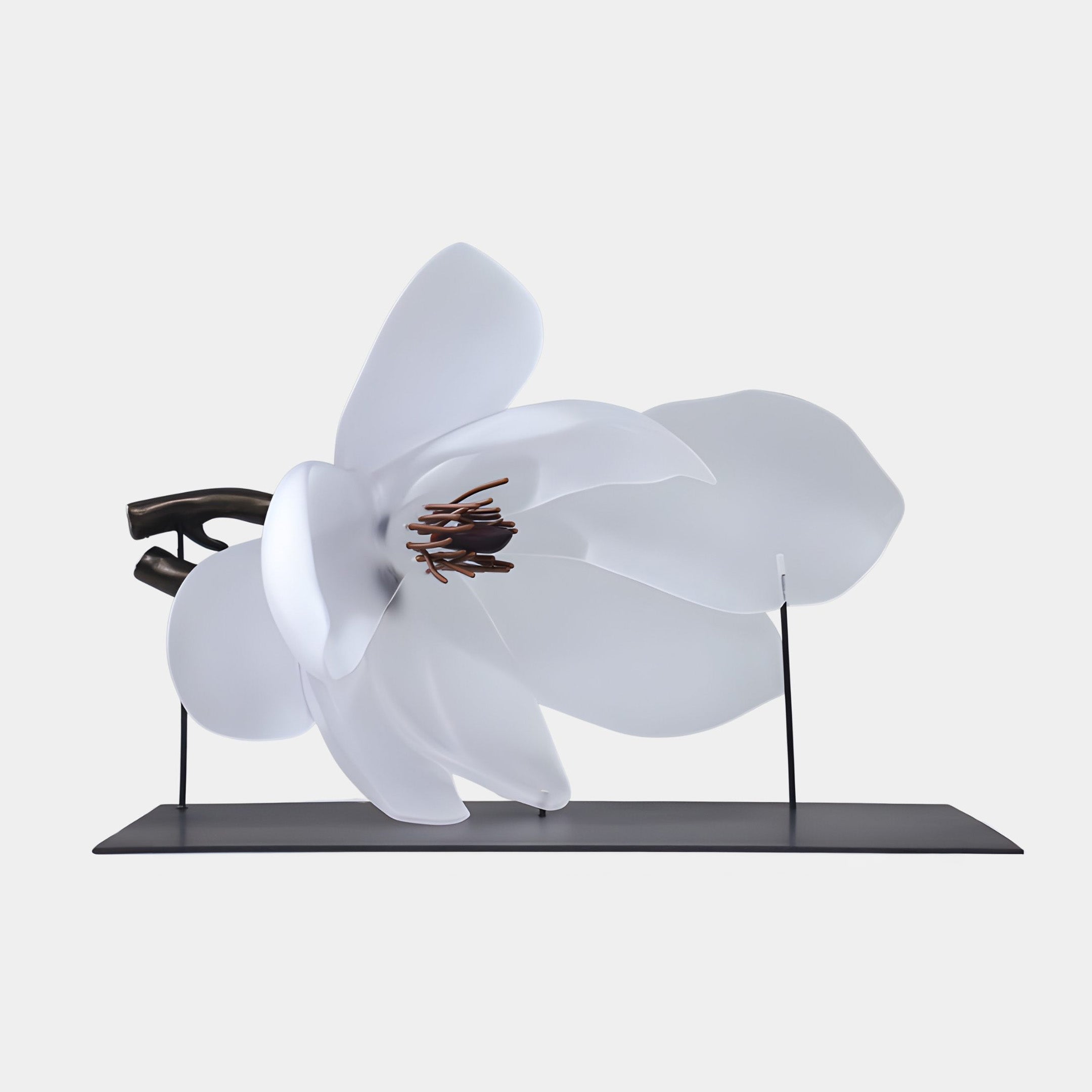 White Abstract Orchid Flower sculpture by Giant Sculptures, shown side-on with translucent resin petals around an amber centre, mounted on a slim black base.