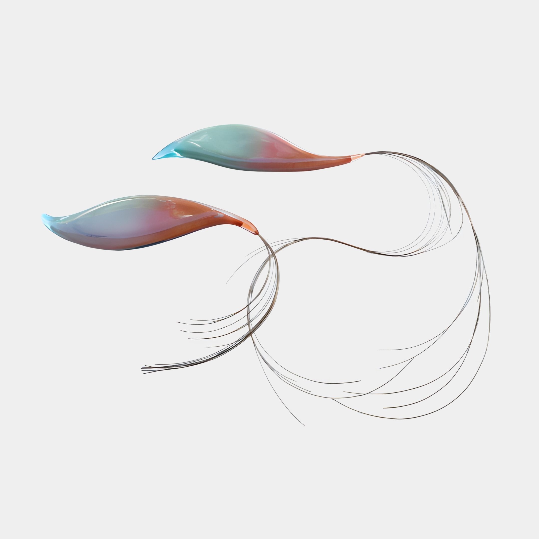 Iridescent Peach & Teal Comet Trail Wall Art by Giant Sculptures, with two glossy leaf-shaped blades trailing fine filament tails across a plain white background.