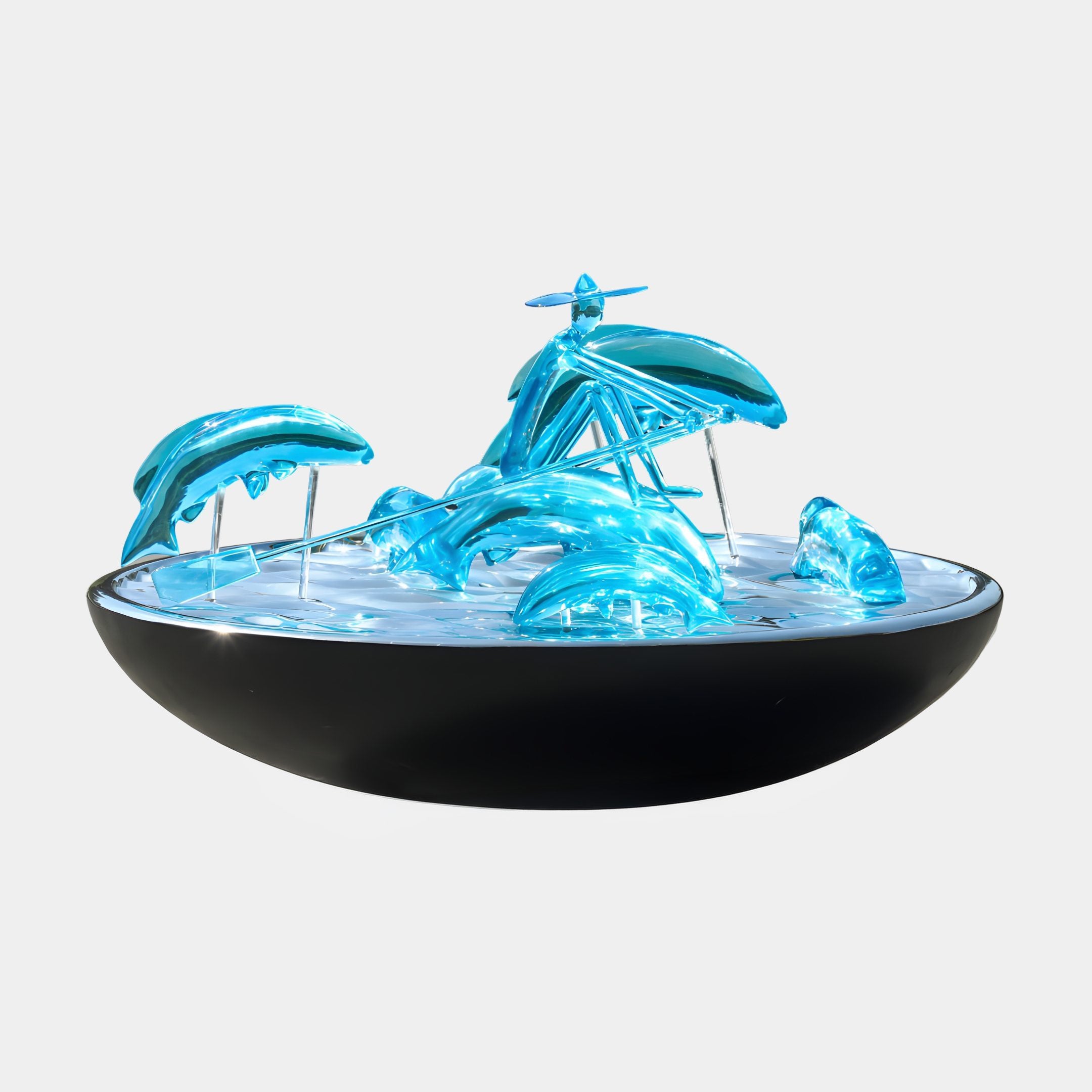 Azure Blue Fisherman & Jumping Dolphin Basin Resin Sculpture by Giant Sculptures, translucent blue figure and leaping dolphins on a glossy black bowl, plain background.